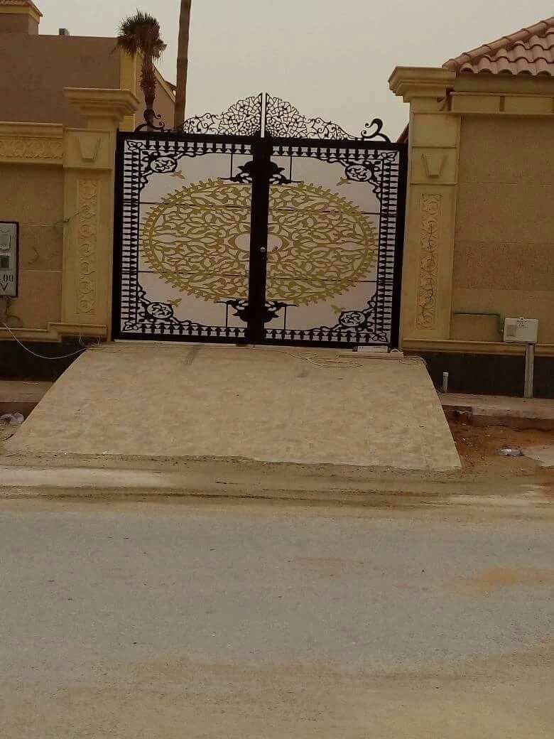اسعار ابواب الكراجات الحديد العادية وافضل ورشة ابواب حي النسيم